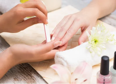nail-technician-giving-customer-manicure